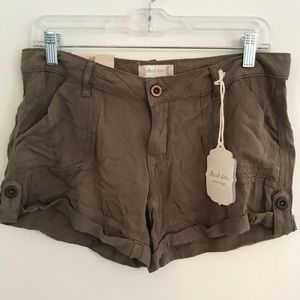 100% rayon olive colored shorts